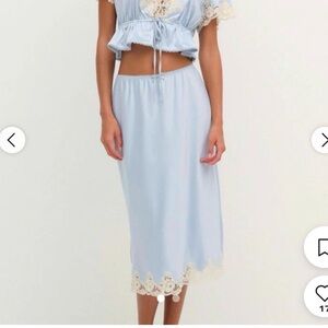 ISO.
For Love and Lemons sweetheart satin midi skirt. Not for sale